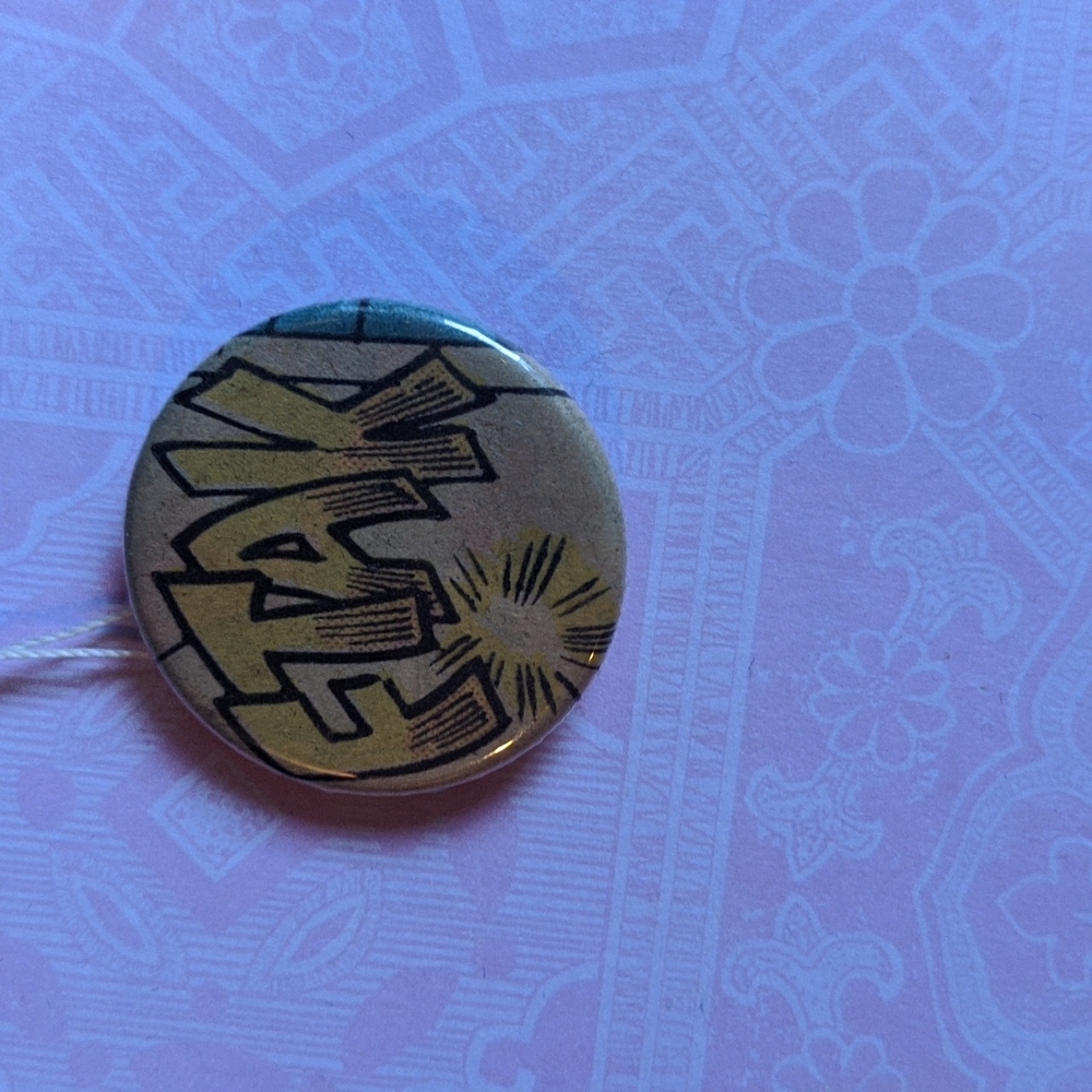 Sound effect pin made from vintage comic